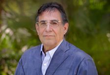 Outdoor portrait: man in blazer and glasses