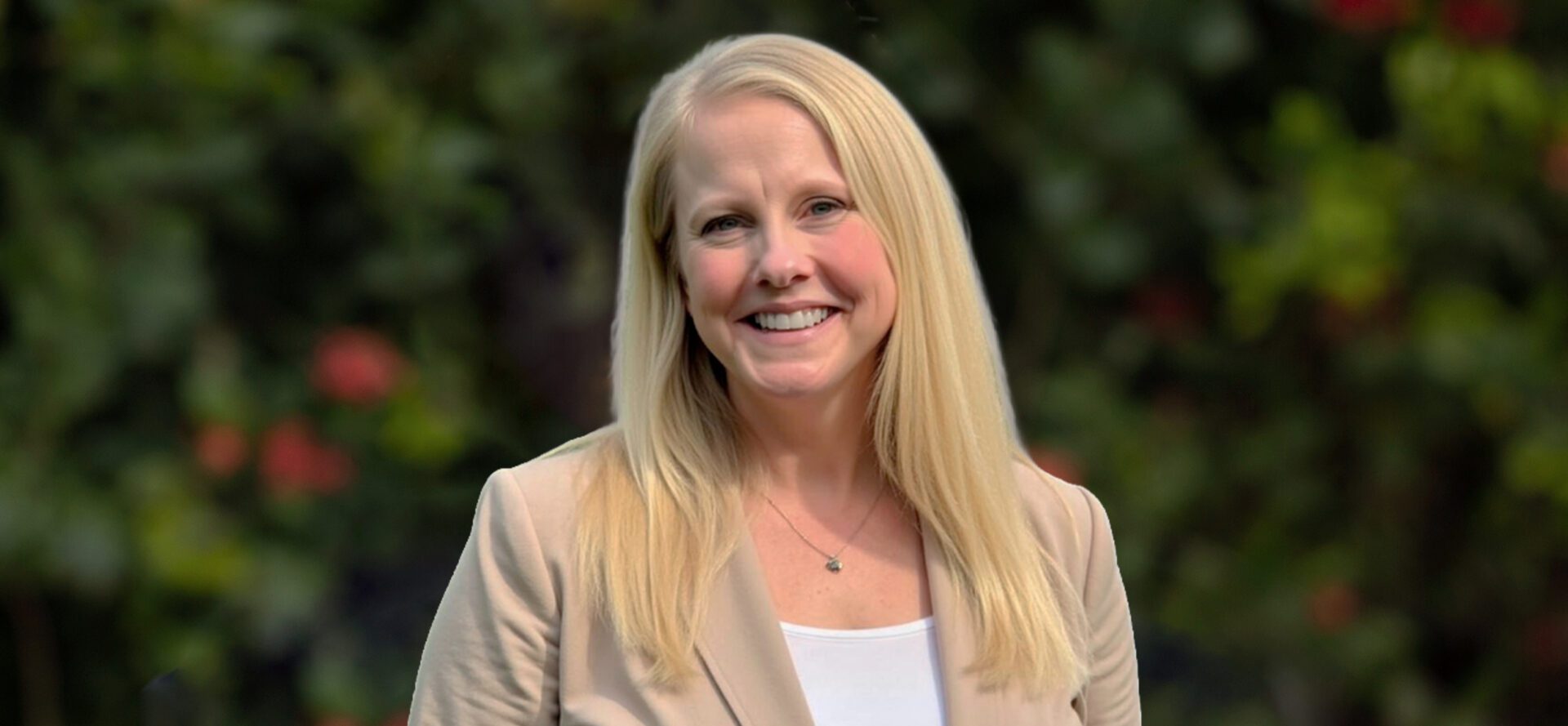 Smiling blonde woman outdoors